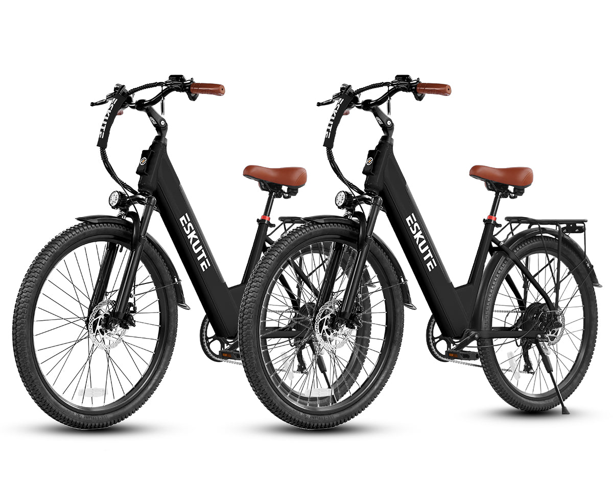Two black electric bikes with brown seats on a white background