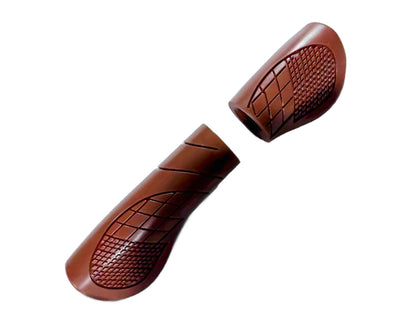 Brown ergonomic handlebar grips with textured diamond pattern for enhanced grip and comfort on e-bikes.
