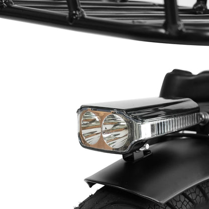 Dual-lens front headlight with a black housing and chrome accents, mounted on an e-bike.